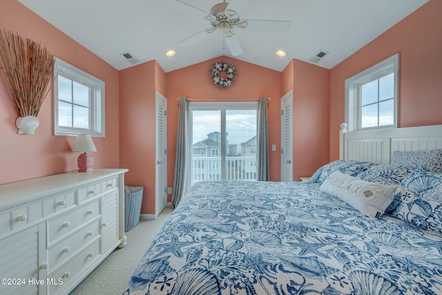 carpeted bedroom with access to exterior, multiple windows, and ceiling fan