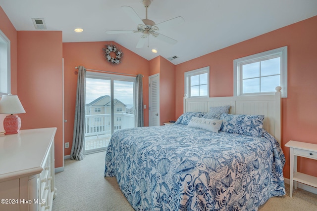 bedroom with access to exterior, multiple windows, lofted ceiling, and ceiling fan