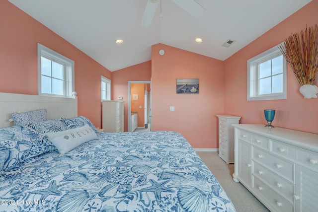 carpeted bedroom featuring ceiling fan and vaulted ceiling