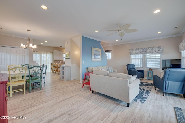 132 Reeves St, North Topsail Beach, NC 28460 - living area featuring healthy amount of natural light, light wood-style flooring, a ceiling fan, crown molding, and recessed lighting