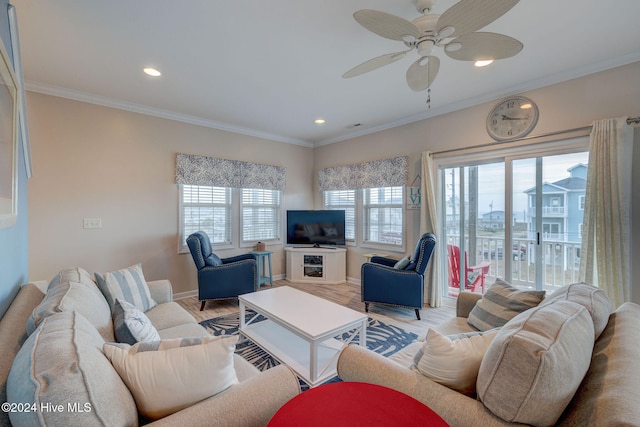 living room featuring ceiling fan, wood-type flooring, and ornamental molding