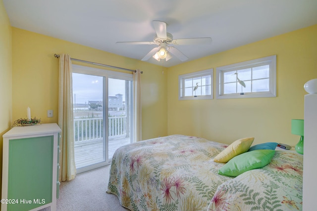 carpeted bedroom with access to exterior and ceiling fan