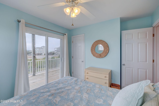 bedroom with access to outside and ceiling fan