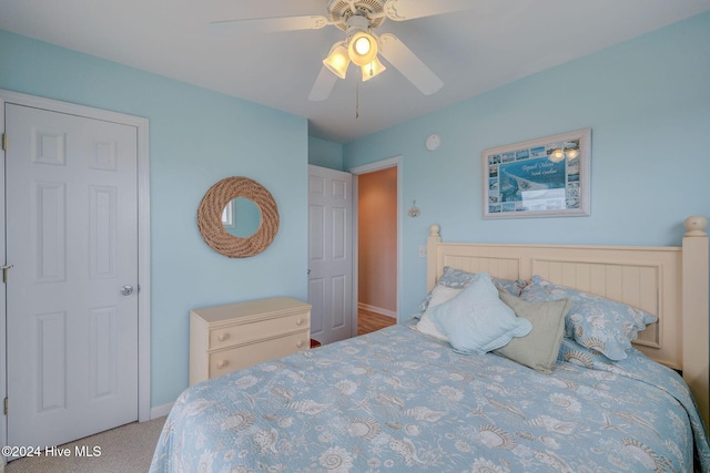 132 Reeves St, North Topsail Beach, NC 28460 - bedroom with a ceiling fan and carpet floors