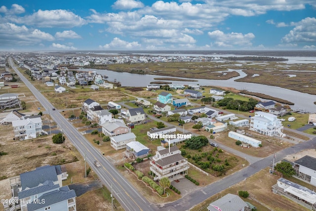 132 Reeves St, North Topsail Beach, NC 28460 - aerial perspective of suburban area with a nearby body of water