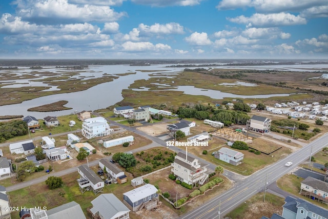 132 Reeves St, North Topsail Beach, NC 28460 - aerial perspective of suburban area featuring a large body of water