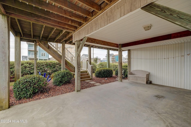 132 Reeves St, North Topsail Beach, NC 28460 - view of patio / terrace with stairway