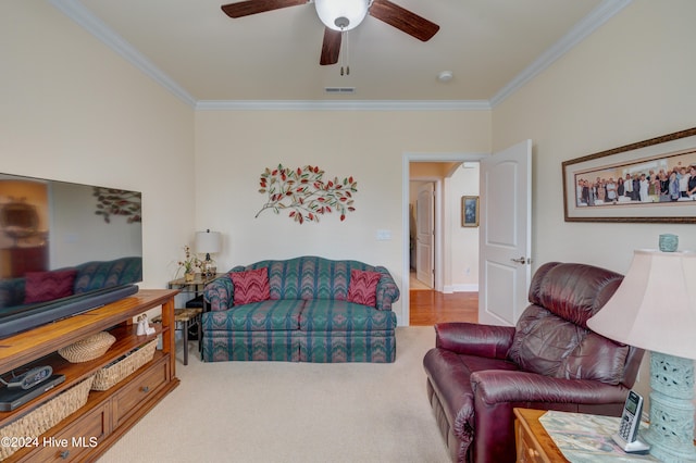 living room featuring ceiling fan and ornamental molding