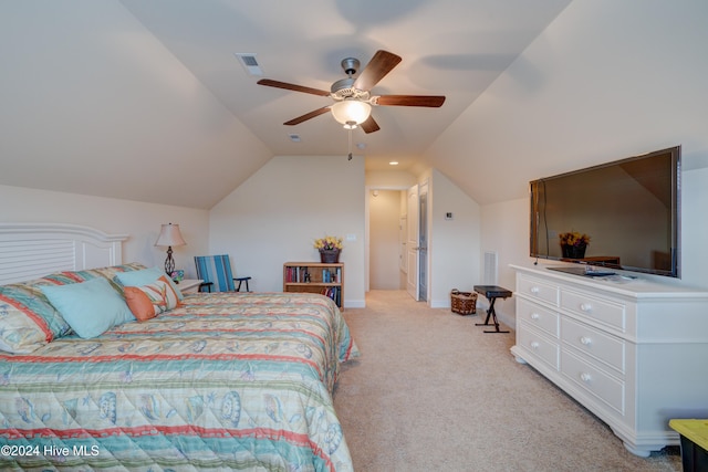 bedroom with light carpet, ceiling fan, and vaulted ceiling