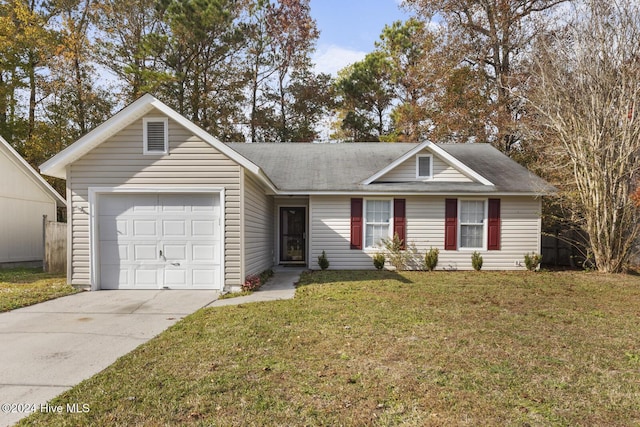 ranch-style house with a garage and a front lawn