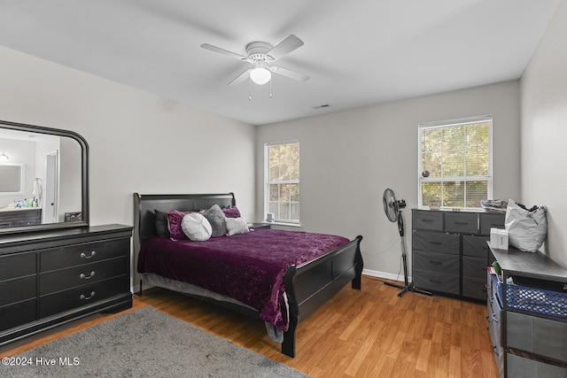 bedroom featuring hardwood / wood-style floors and ceiling fan