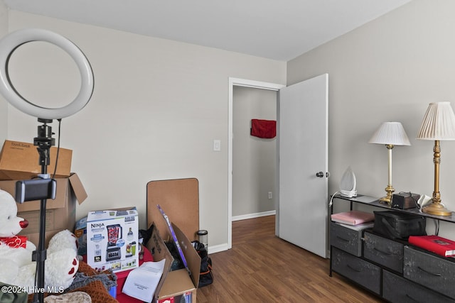 miscellaneous room featuring dark hardwood / wood-style floors