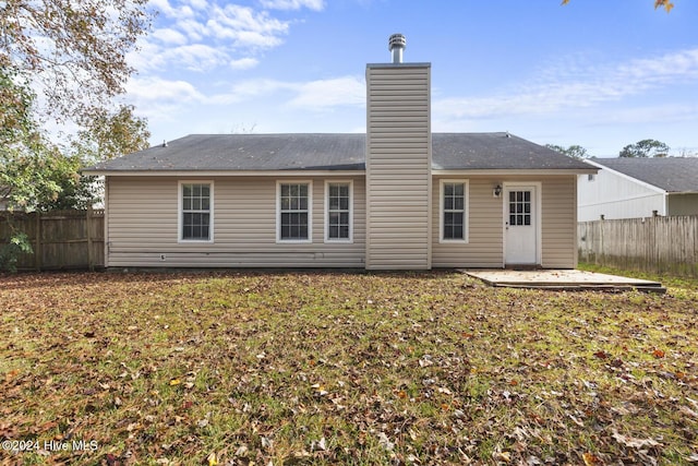 rear view of property with a patio area