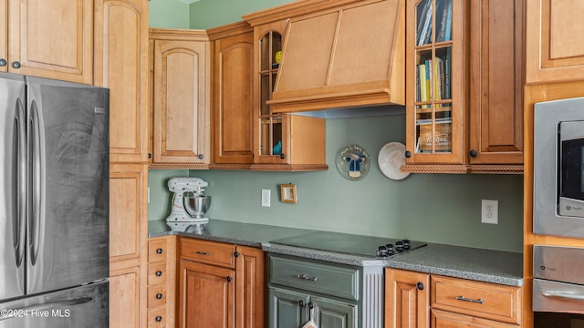 kitchen with stainless steel appliances and custom exhaust hood