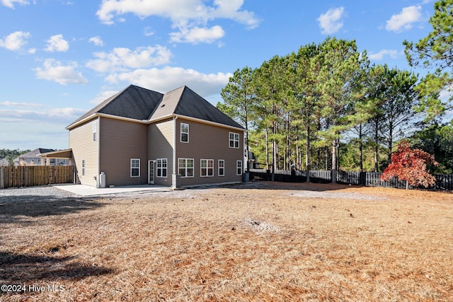 rear view of property with a patio area