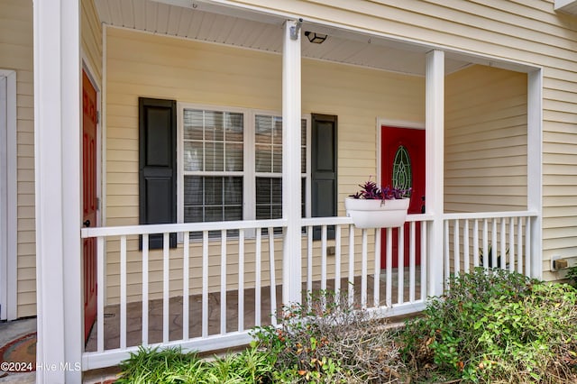 entrance to property with covered porch