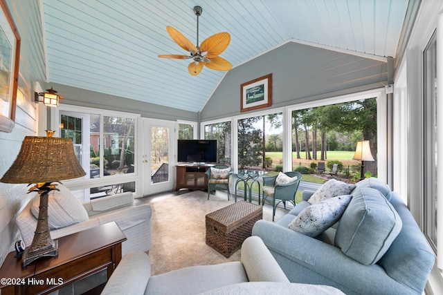 sunroom featuring ceiling fan, wooden ceiling, and vaulted ceiling