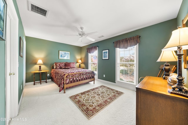 bedroom featuring ceiling fan and carpet floors