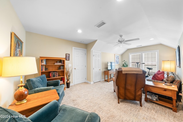 bedroom featuring light carpet, ceiling fan, and lofted ceiling