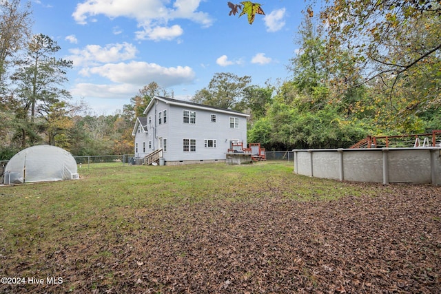 16200 US Highway 421, Burgaw, NC 28425 - rear view of property featuring an exterior structure, an outbuilding, and an outdoor pool