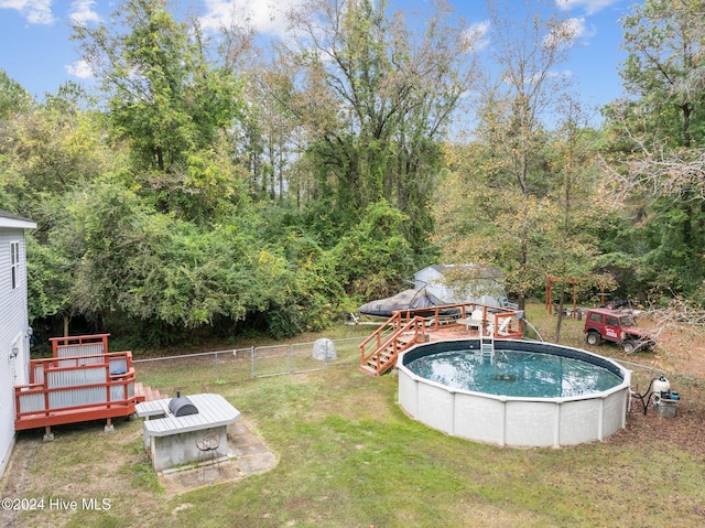 16200 US Highway 421, Burgaw, NC 28425 - view of yard with a wooden deck, an outdoor pool, and a fire pit