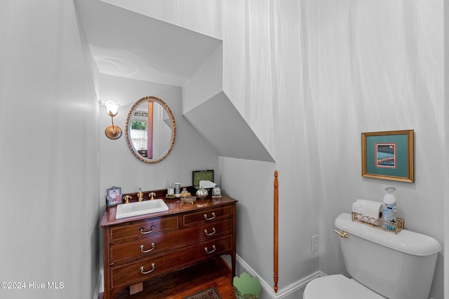 505 Broad St, Oriental, NC 28571 - bathroom with toilet, vanity, and baseboards