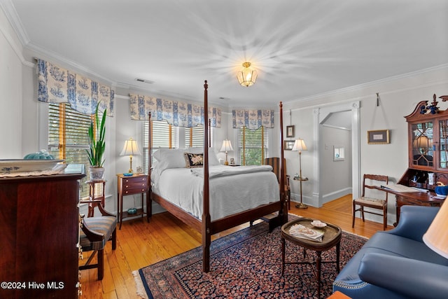 505 Broad St, Oriental, NC 28571 - bedroom with crown molding, light wood-style floors, and baseboards