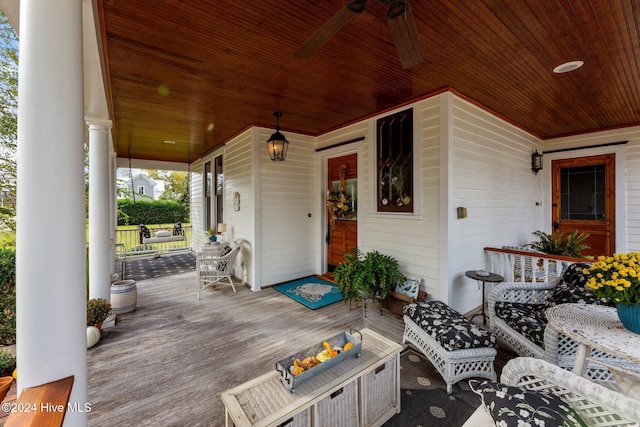 wooden terrace featuring a porch