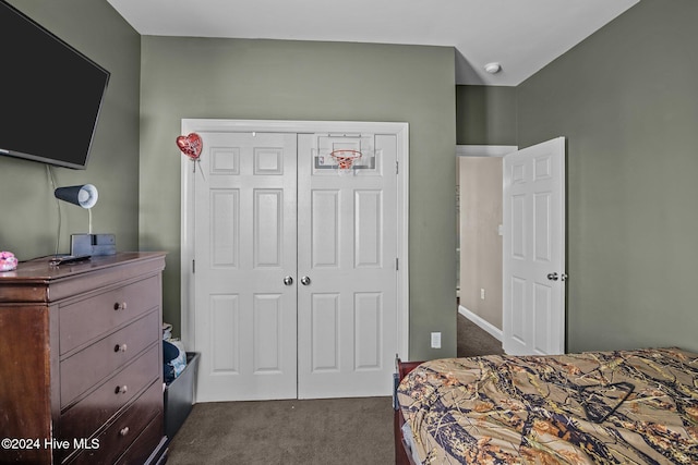 carpeted bedroom featuring a closet