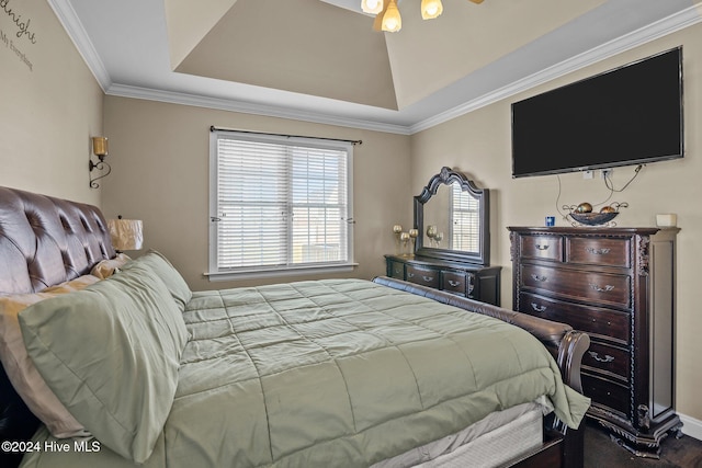 bedroom featuring hardwood / wood-style floors and crown molding