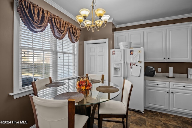 dining room featuring an inviting chandelier and crown molding