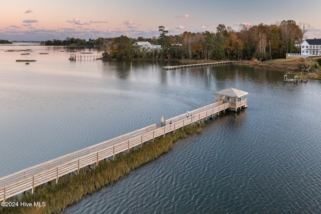 view of dock with a water view