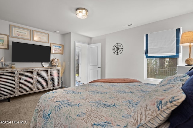 bedroom featuring carpet flooring