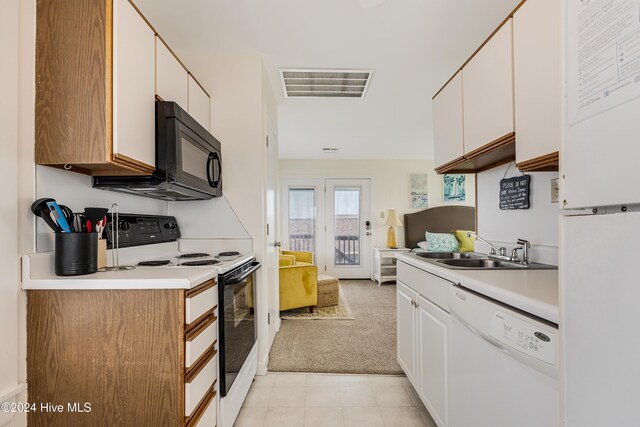 laundry room with stacked washing maching and dryer