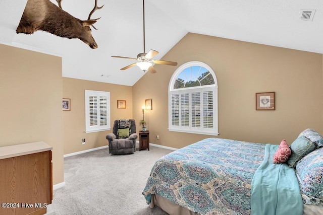 carpeted bedroom featuring ceiling fan and lofted ceiling