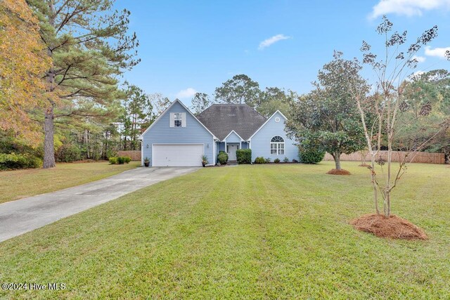 view of front of home with a front lawn