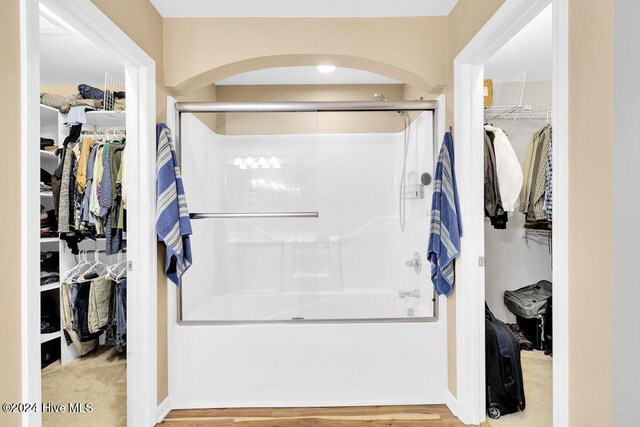 bathroom featuring walk in shower