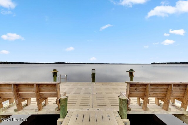 dock area featuring a water view