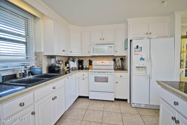 kitchen featuring white appliances, crown molding, sink, tasteful backsplash, and white cabinetry