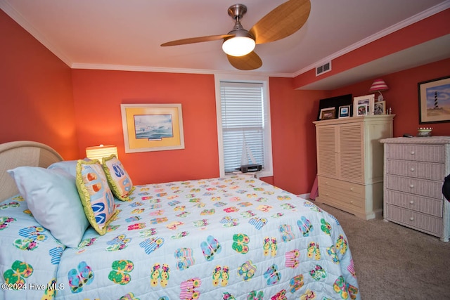 bedroom with ceiling fan, carpet floors, and ornamental molding