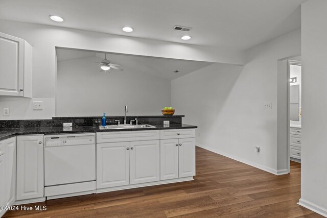 garage with electric panel and a garage door opener