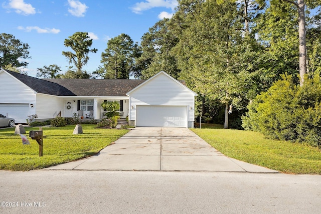 ranch-style home with driveway, a garage, and a front lawn