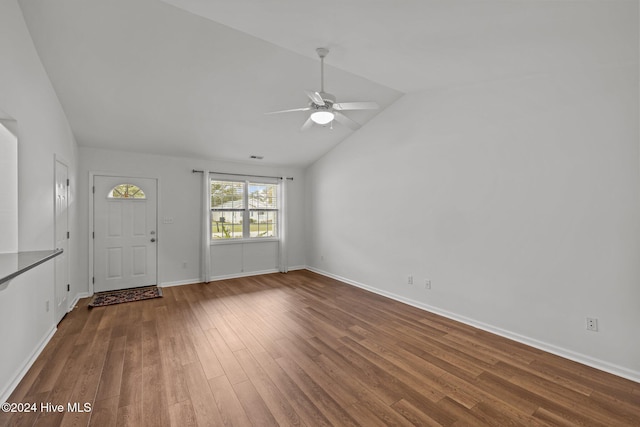 entryway with hardwood / wood-style flooring, ceiling fan, and vaulted ceiling