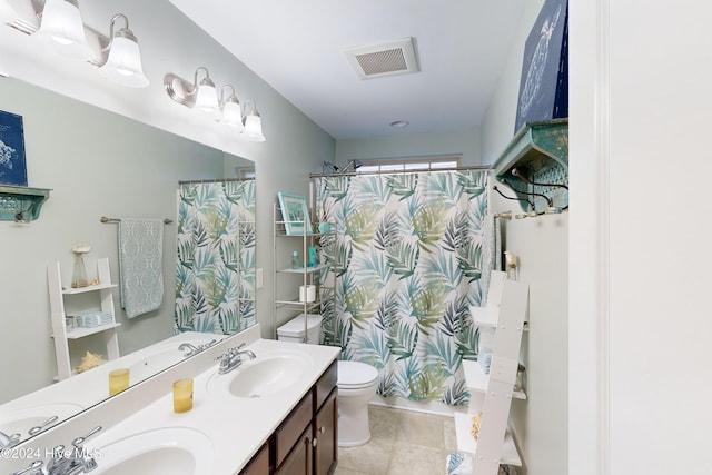 bathroom featuring tile patterned floors, vanity, toilet, and a shower with curtain