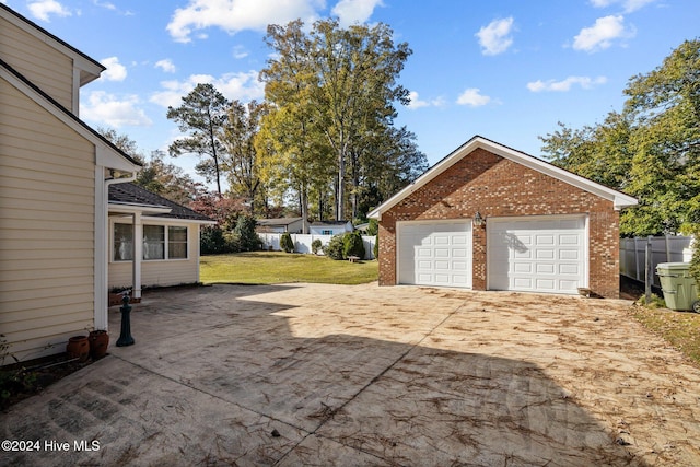 garage with a lawn