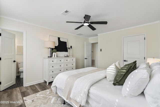 bedroom with ornamental molding, dark hardwood / wood-style floors, ensuite bathroom, and ceiling fan