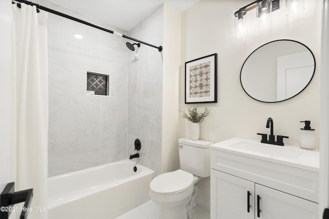 full bathroom featuring vanity, toilet, and shower / bath combo