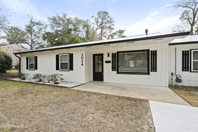 single story home featuring a patio area