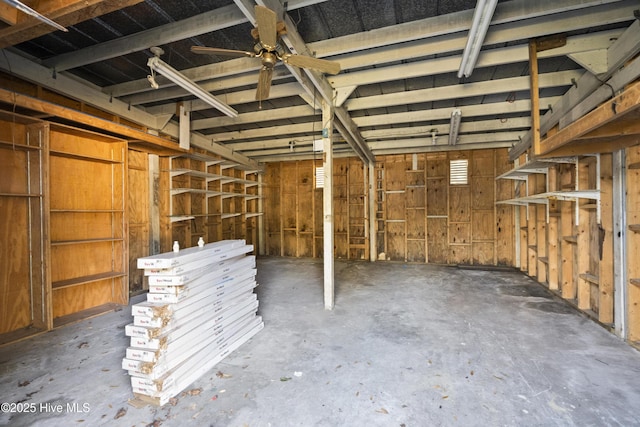 basement with ceiling fan