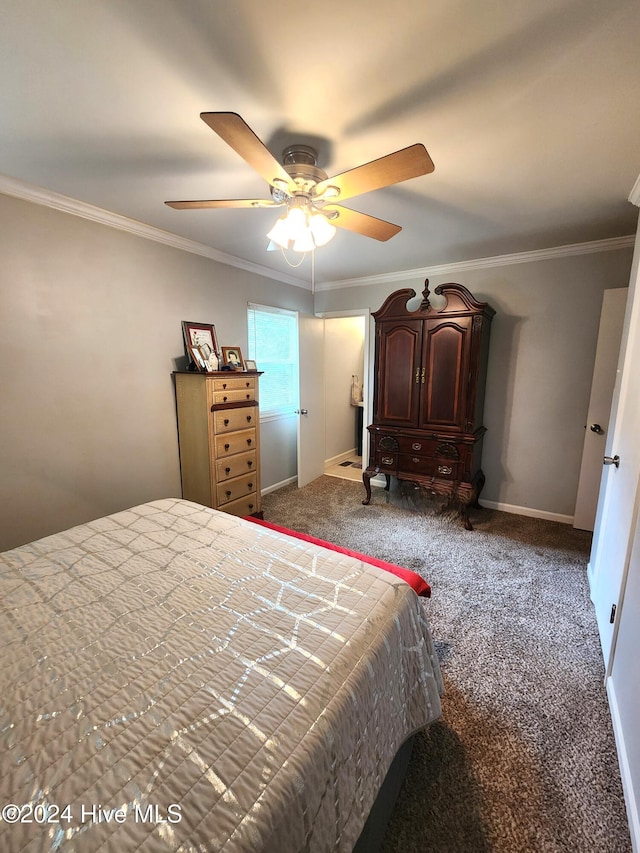 carpeted bedroom featuring ceiling fan, baseboards, and ornamental molding